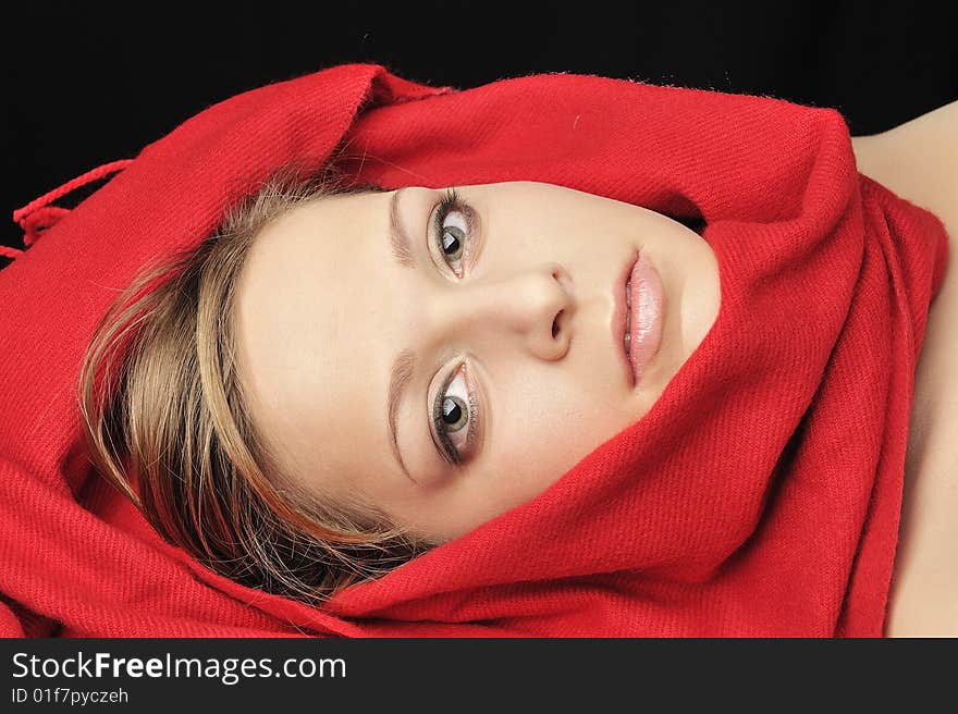 Girl lying , Wearing a red color scarf