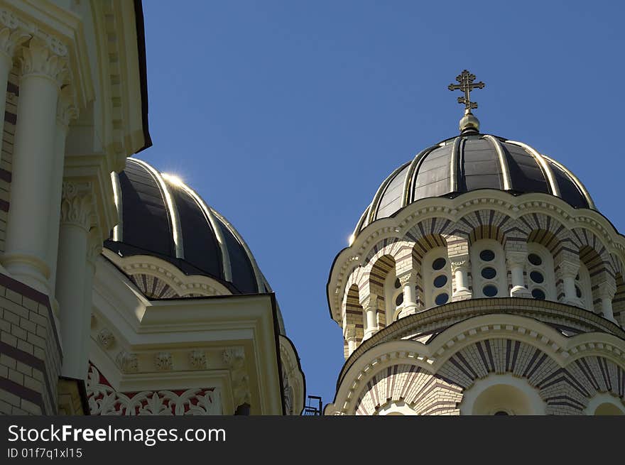 Downtown, Riga, Latvia.
Morning sun shines on the golden domes of the Riga Orthodox Cathedral. Built in 19-th century this Russian cathedral has been lutheran church under Germans and planetarium under soviet rule. Now it functions again as a Nativity of Christ Cathedral. Downtown, Riga, Latvia.
Morning sun shines on the golden domes of the Riga Orthodox Cathedral. Built in 19-th century this Russian cathedral has been lutheran church under Germans and planetarium under soviet rule. Now it functions again as a Nativity of Christ Cathedral.