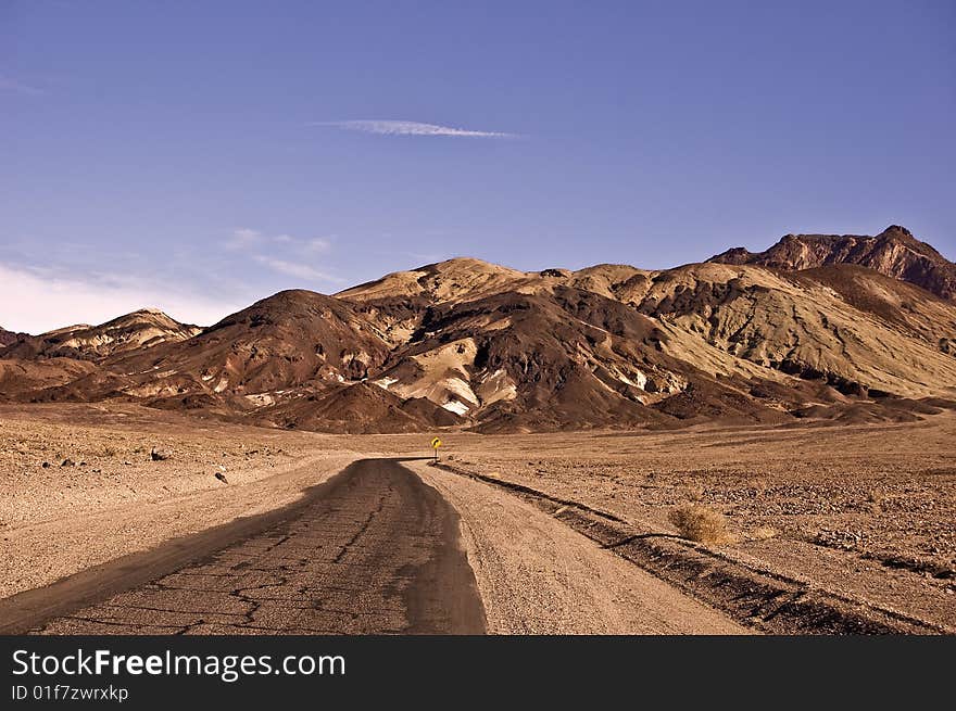 This is a picture of a one-way road into the Death Valley mountains. This is a picture of a one-way road into the Death Valley mountains.
