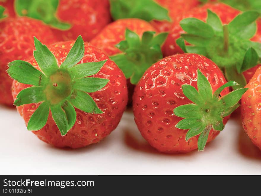 A close up shot of strawberry. A close up shot of strawberry