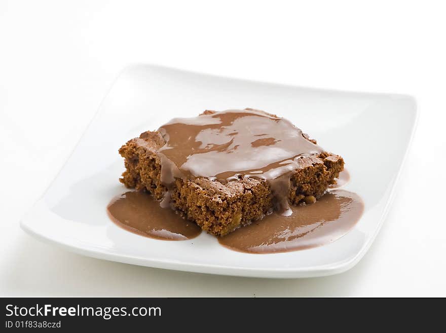 Hot chocolate brownie with walnuts and vanilla isolated