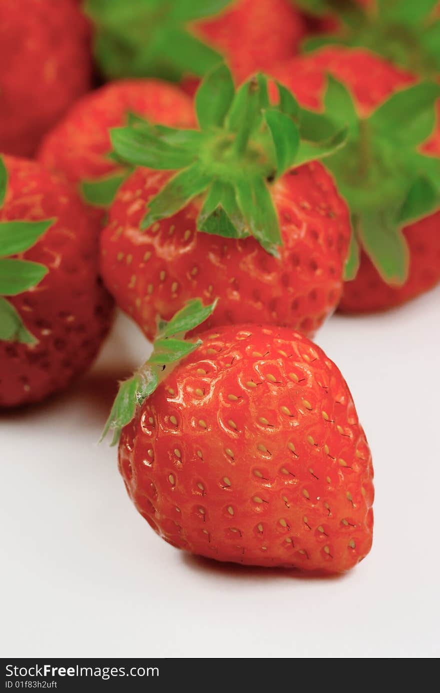 A close up shot of strawberry. A close up shot of strawberry