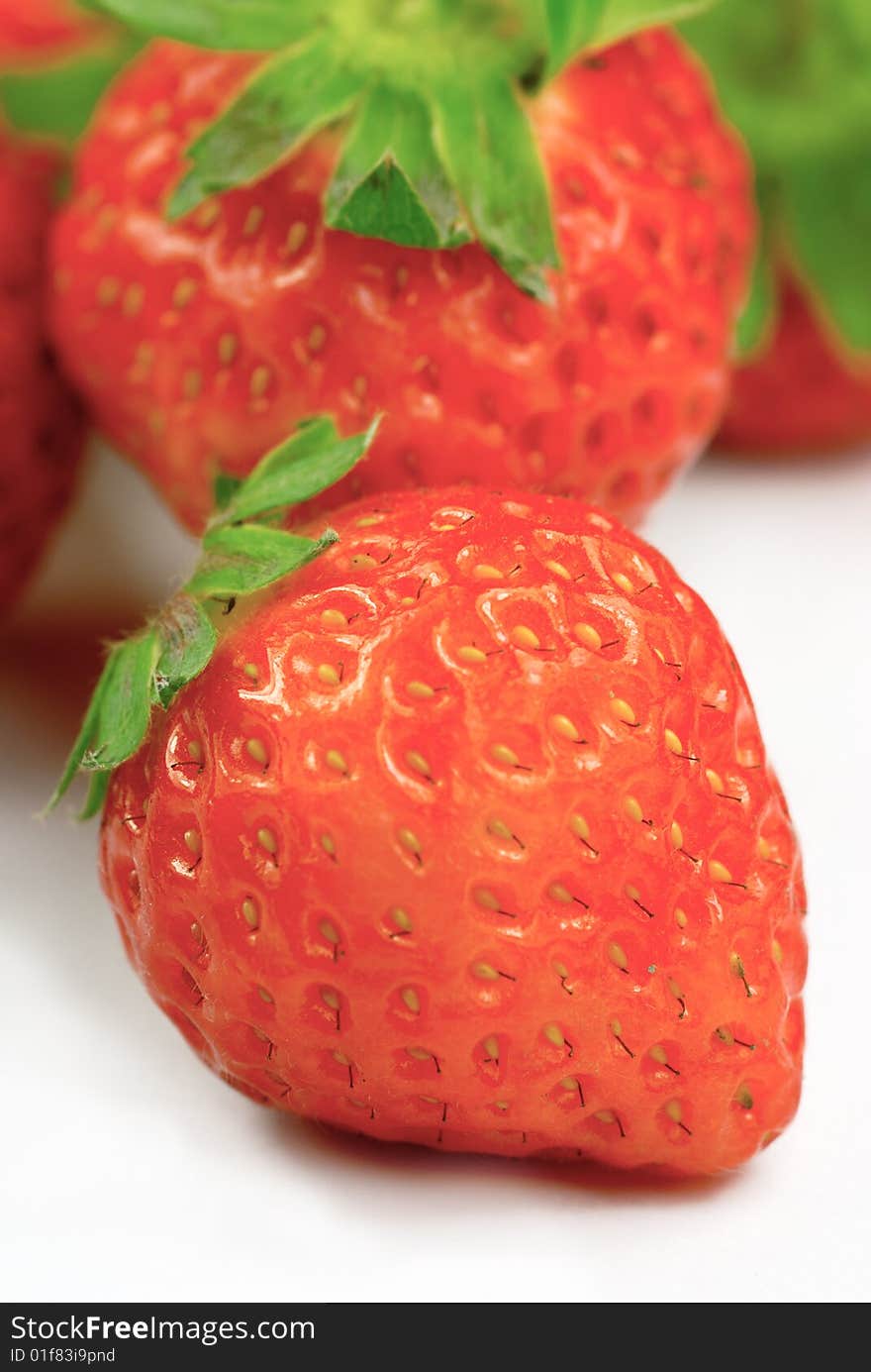 A close up shot of strawberry. A close up shot of strawberry