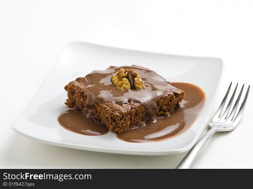 Hot chocolate brownie with walnuts and vanilla