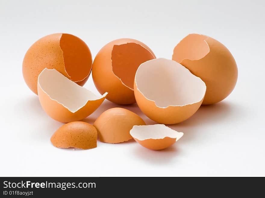 Few broken and empty eggs in one photo. Few broken and empty eggs in one photo.