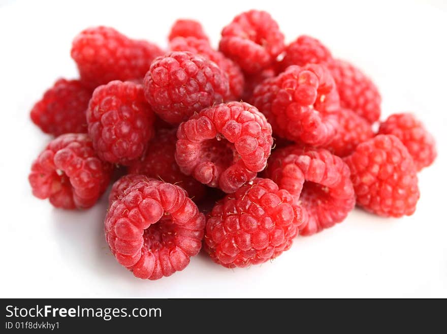 Raspberries on a White Dish