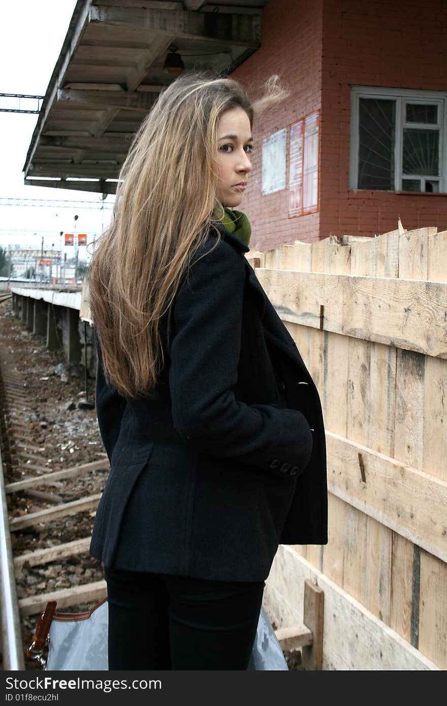 A girl travels by train