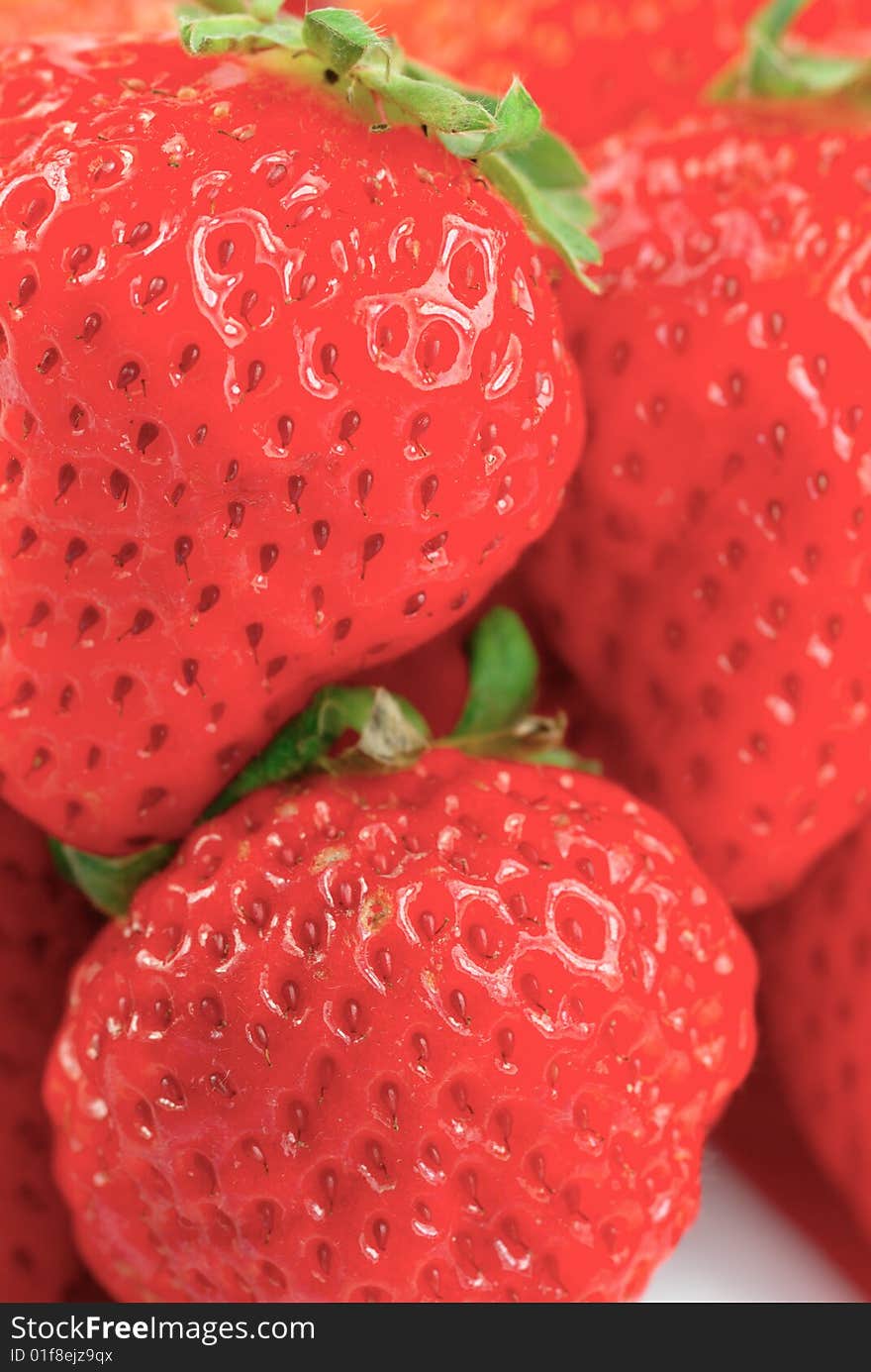 A close up shot of strawberry. A close up shot of strawberry