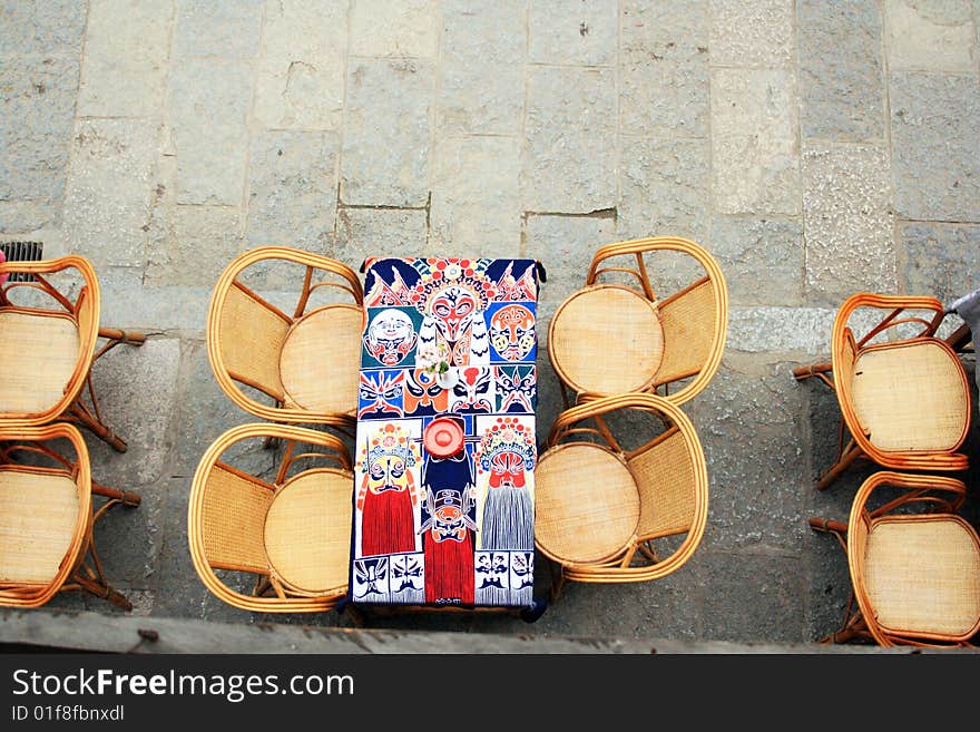 Some chairs in a chinese outdoor bar