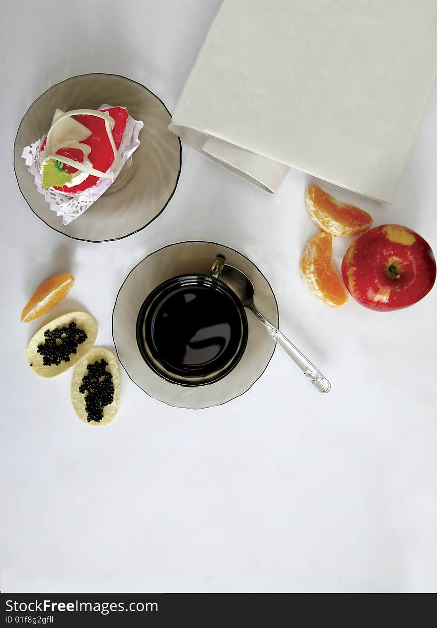 Table with cup coffee, fruits