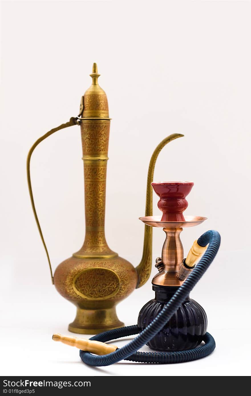 Hookah and jug on a white background