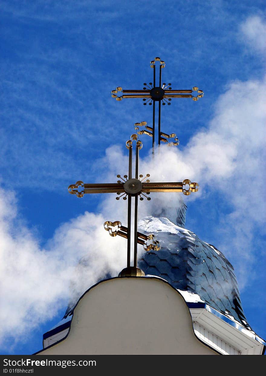 Church Crosses inside white cloud on blue sky background. Church Crosses inside white cloud on blue sky background