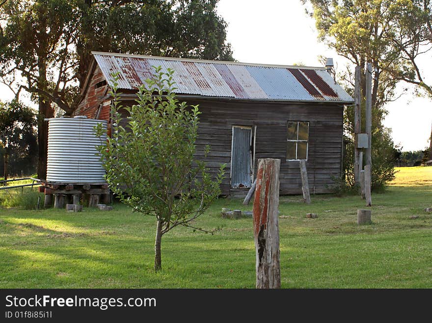 Rusty old house in farmyard. Rusty old house in farmyard