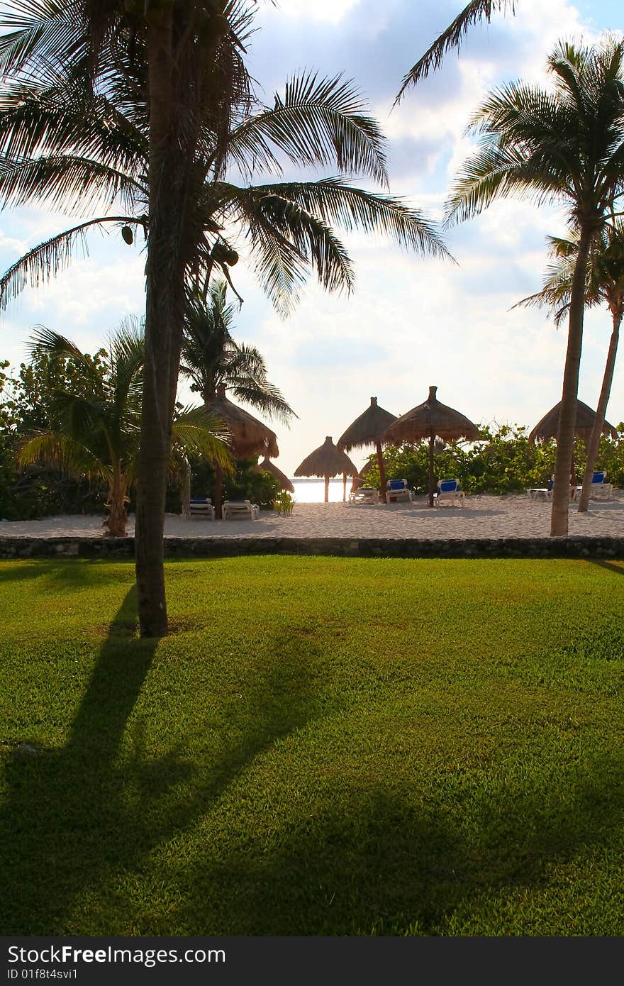 Tropical sky over an empty beach resort. Tropical sky over an empty beach resort.