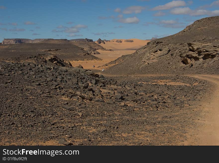 Rock and curve in the desert