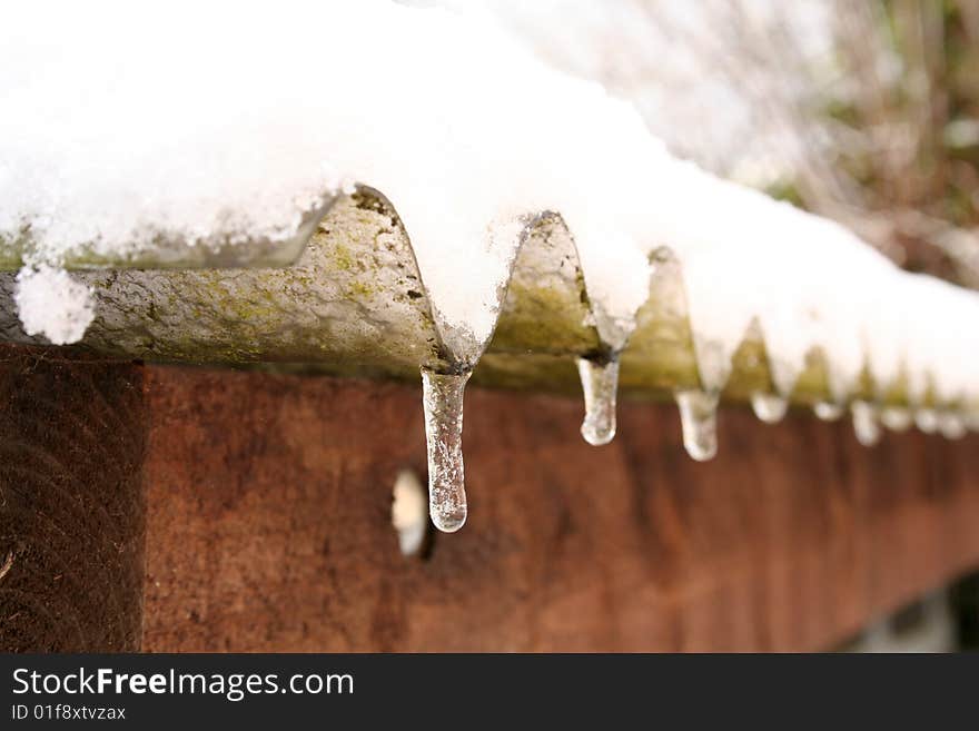 A row of icicles forming