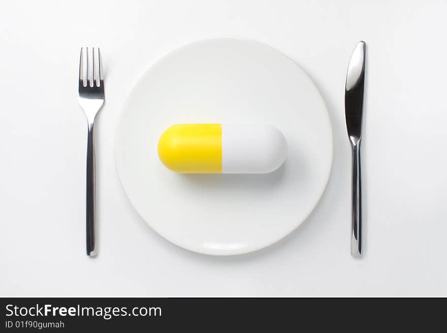 Vitamin on the white plate. Vitamin on the white plate