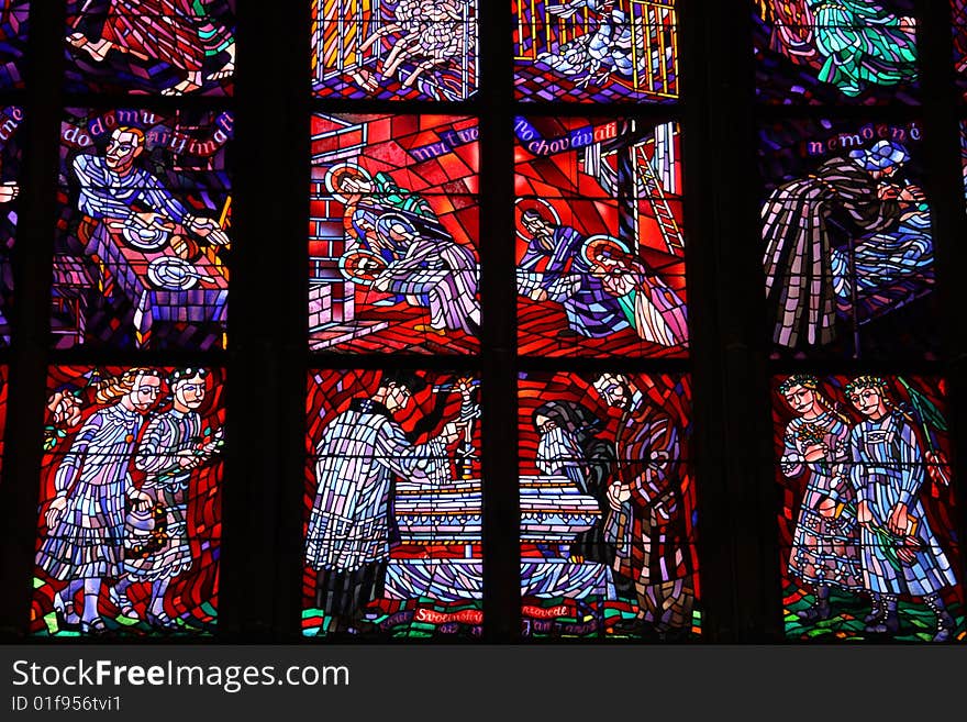 Colorful stained-glass window in St.Vitus cathedral in Czech capital Prague