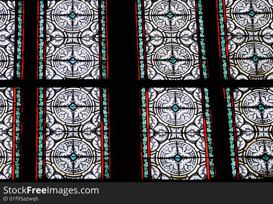 Colorful stained-glass window in St.Vitus cathedral in Czech capital Prague