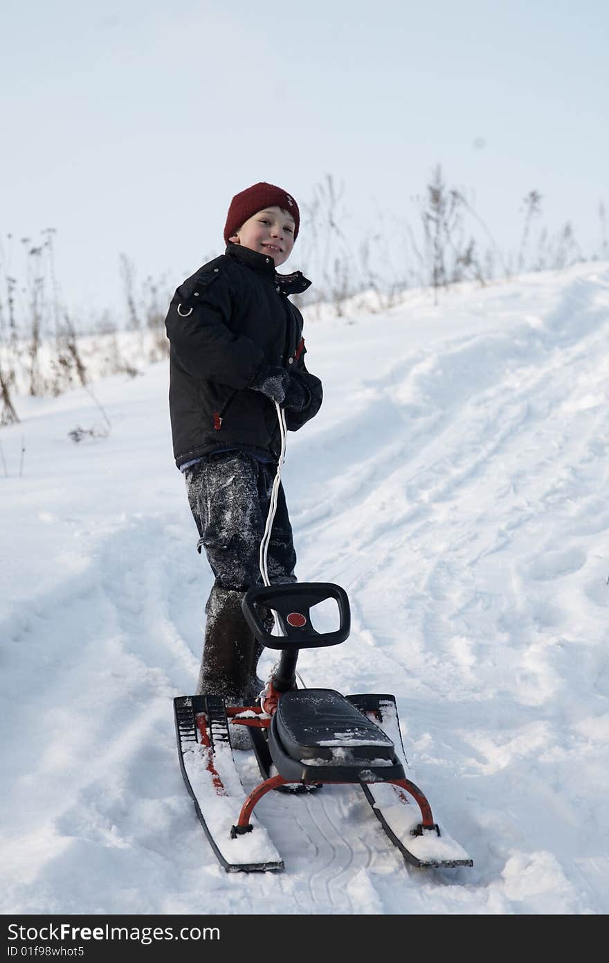 A boy on the sledge