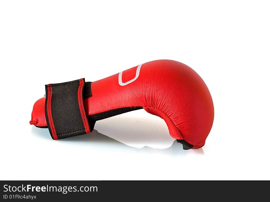 single red boxing glove against a white background