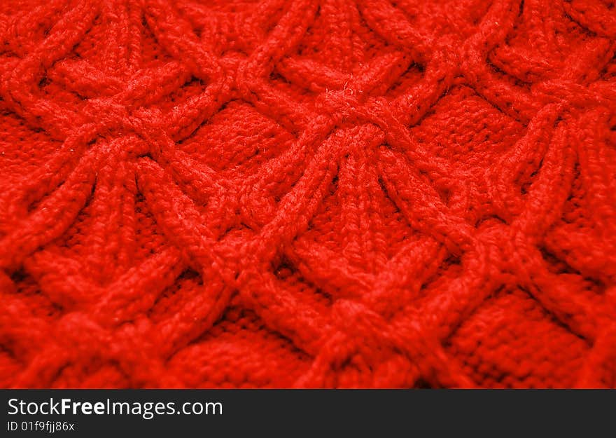 Knitted texture of red color. Knitted texture of red color