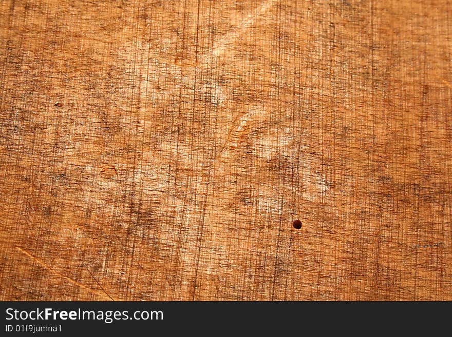 The texture of a brown old wood. The texture of a brown old wood