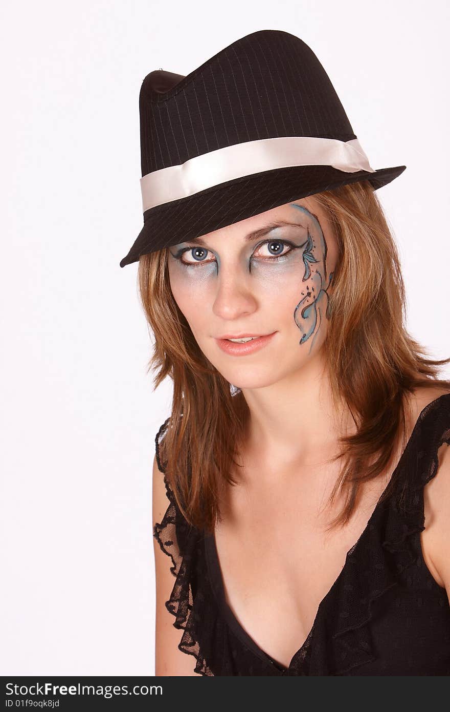 Portrait of girl with blue fantacy makeup and black hat. Portrait of girl with blue fantacy makeup and black hat