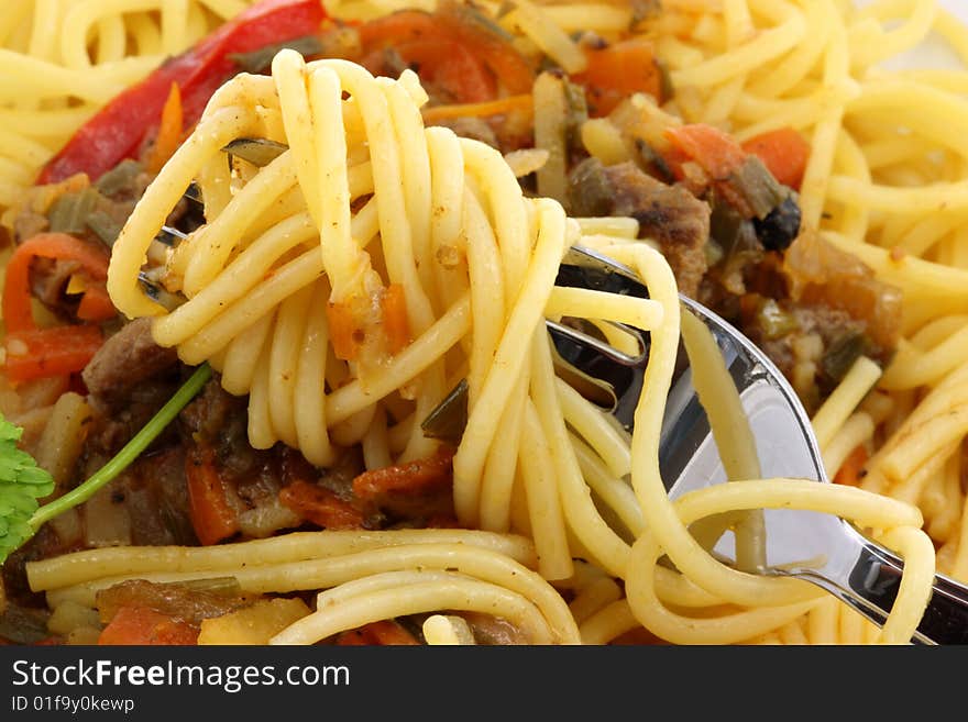 Dinner plate with spaghetti.