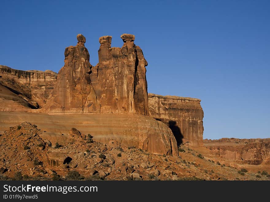 View of the red rock formations in Arches National Park with blue sky�. View of the red rock formations in Arches National Park with blue sky�