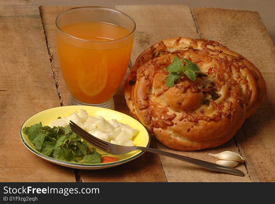 Freshly baked masala bread with juice.