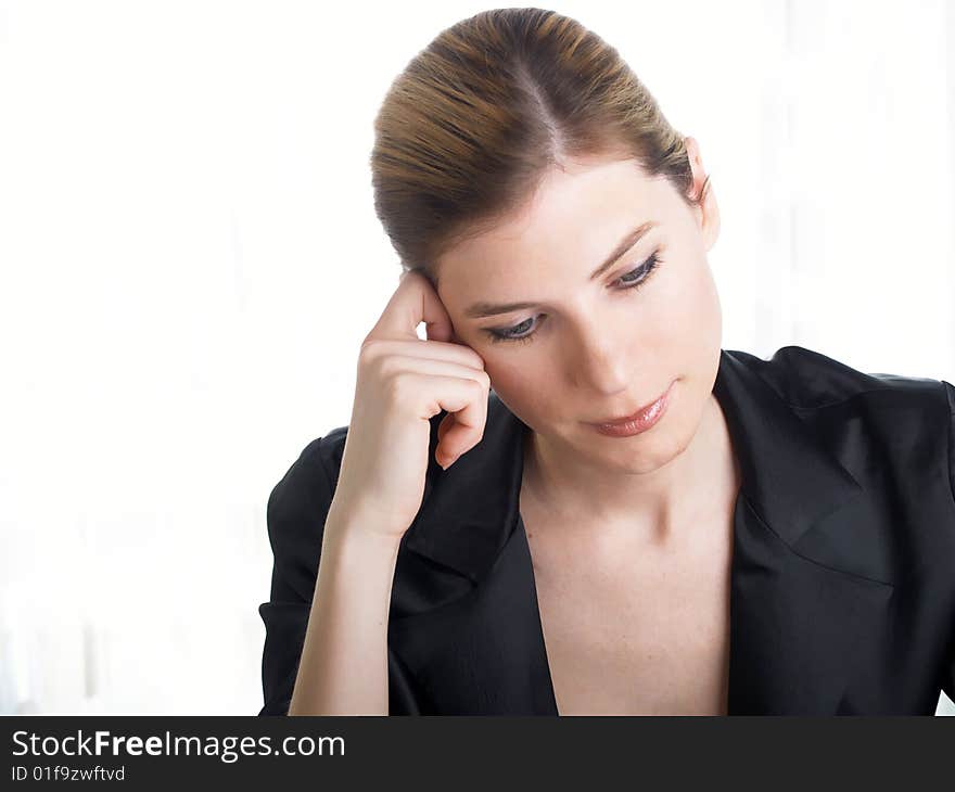 The beautiful businesswoman in a black jacket. The beautiful businesswoman in a black jacket