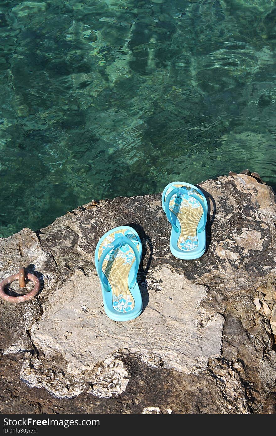 Adriatic sea and slippers