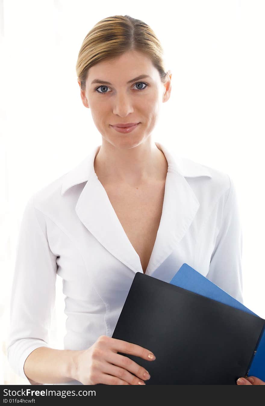 The beautiful businesswoman in a white jacket. The beautiful businesswoman in a white jacket