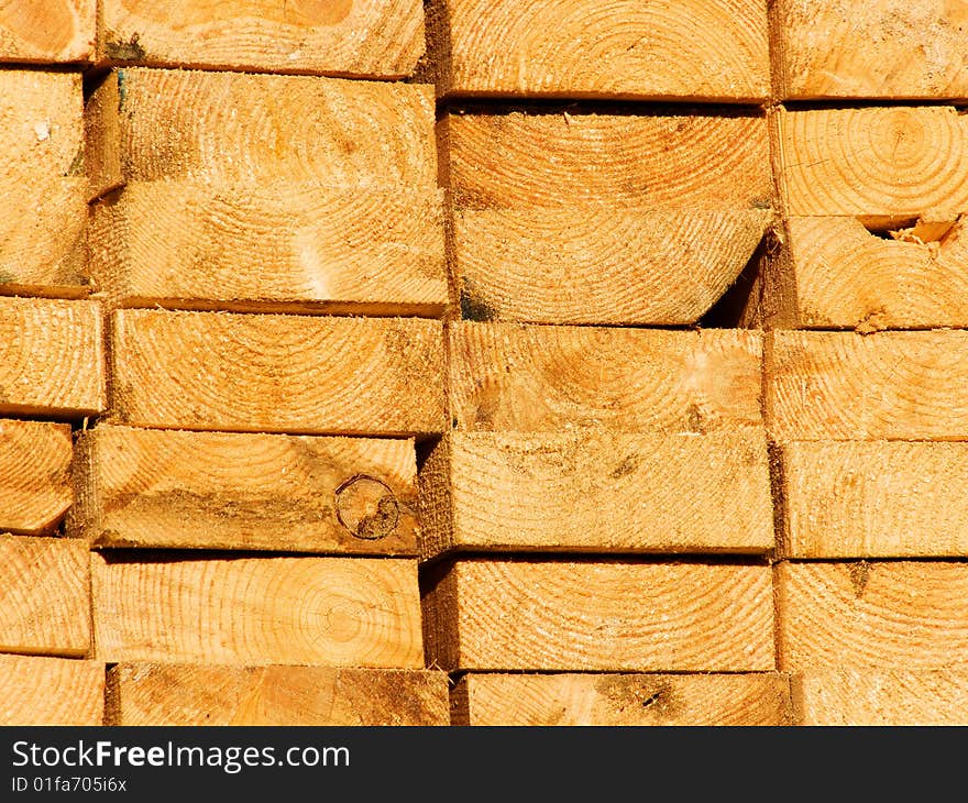 Board of coniferous breeds of a tree in a stack. Board of coniferous breeds of a tree in a stack