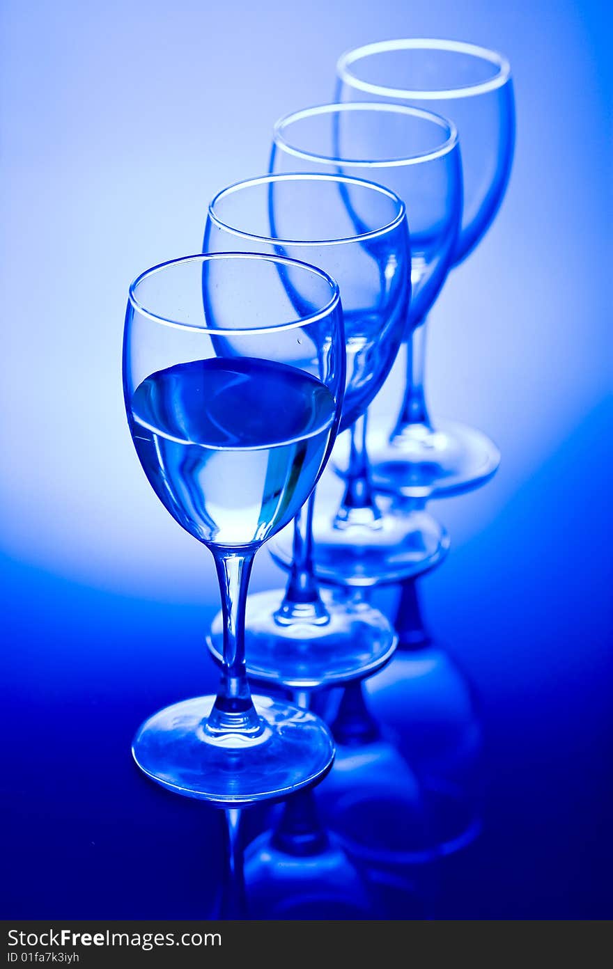 Blue Glass , Coolness Drink, Blue Backgroubd. Blue Glass , Coolness Drink, Blue Backgroubd