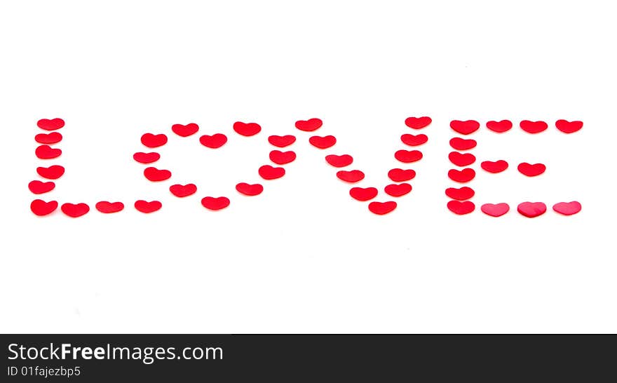 Love spelled with heart shaped figures.