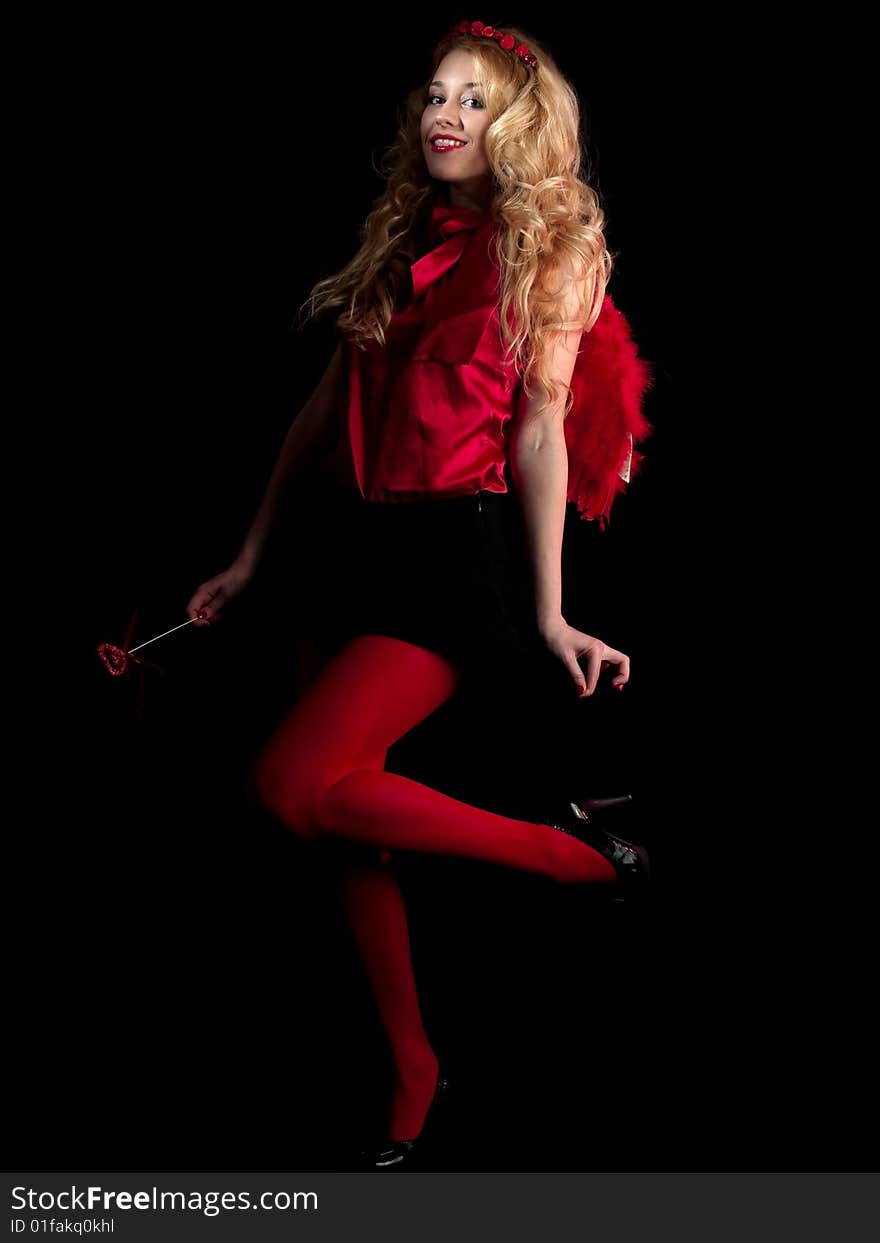 Beautiful teen lady in angel dress on black background. Beautiful teen lady in angel dress on black background