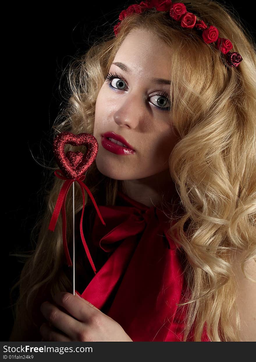 Beautiful teen lady in angel dress on black background. Beautiful teen lady in angel dress on black background