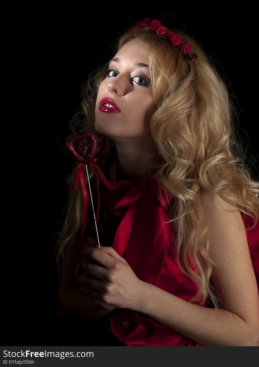 Beautiful teen lady in angel dress on black background. Beautiful teen lady in angel dress on black background