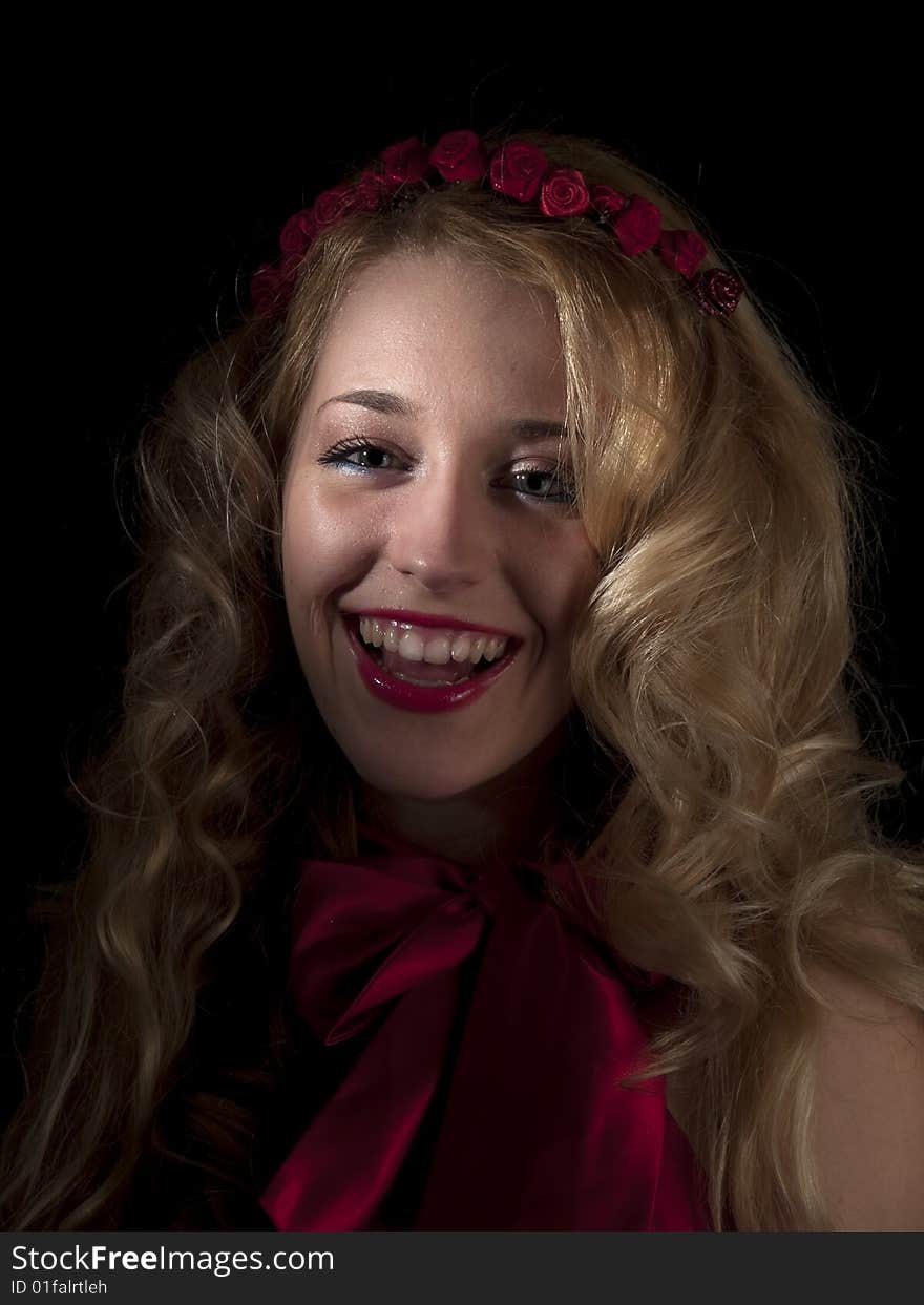 Beautiful teen lady in angel dress on black background. Beautiful teen lady in angel dress on black background