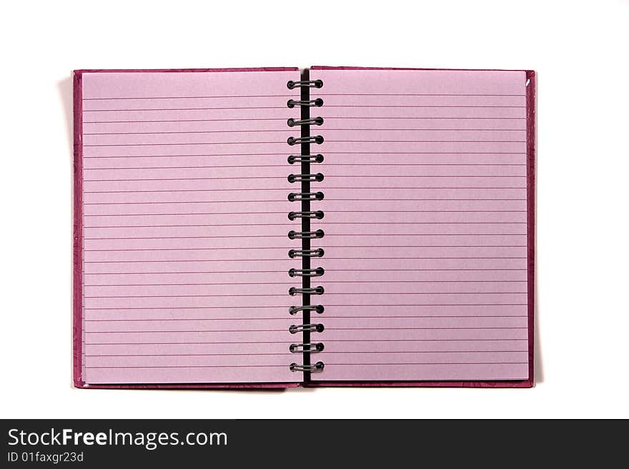 Pink notebook with lined paper isolated on white background