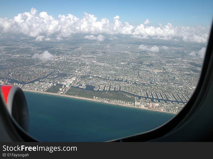 Miami beach after takeoff from an airplane window. Miami beach after takeoff from an airplane window