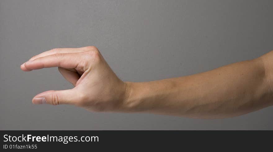 C shape hand gesture sign also look alike a shape of bird beak