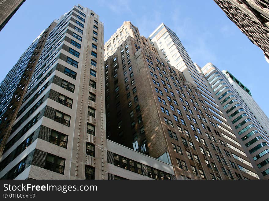 Picture of different office buildings and a blue sky. Picture of different office buildings and a blue sky