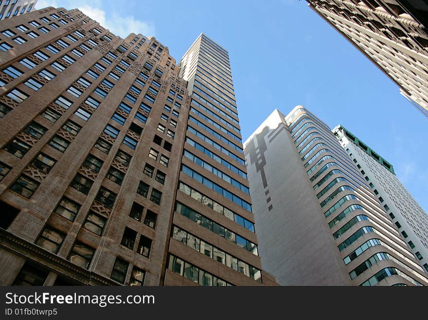 Picture of different office buildings and a blue sky. Picture of different office buildings and a blue sky