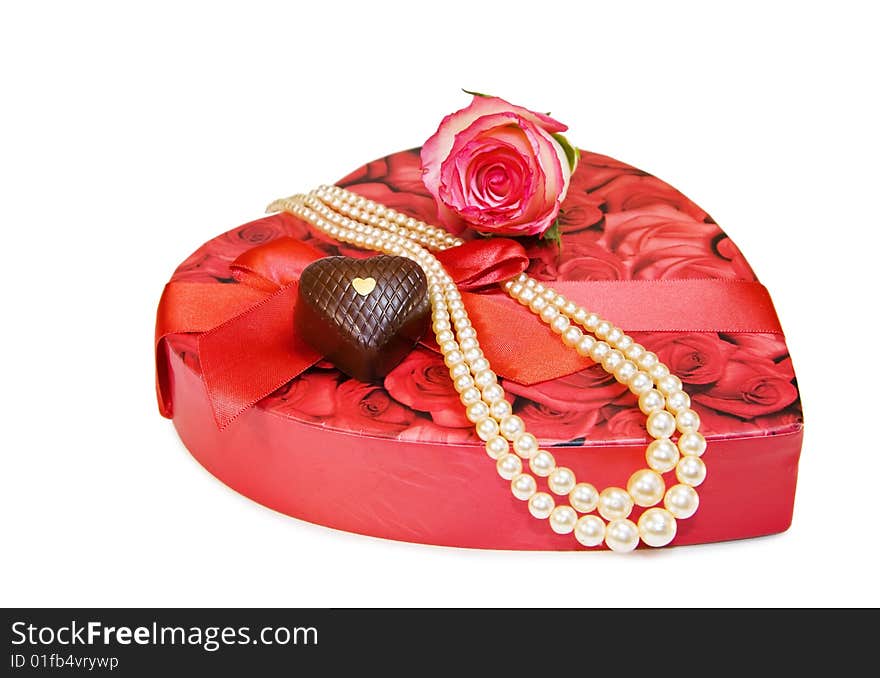 Vintage Valentine - rose and pearls with heart chocolate isolated on white. Vintage Valentine - rose and pearls with heart chocolate isolated on white