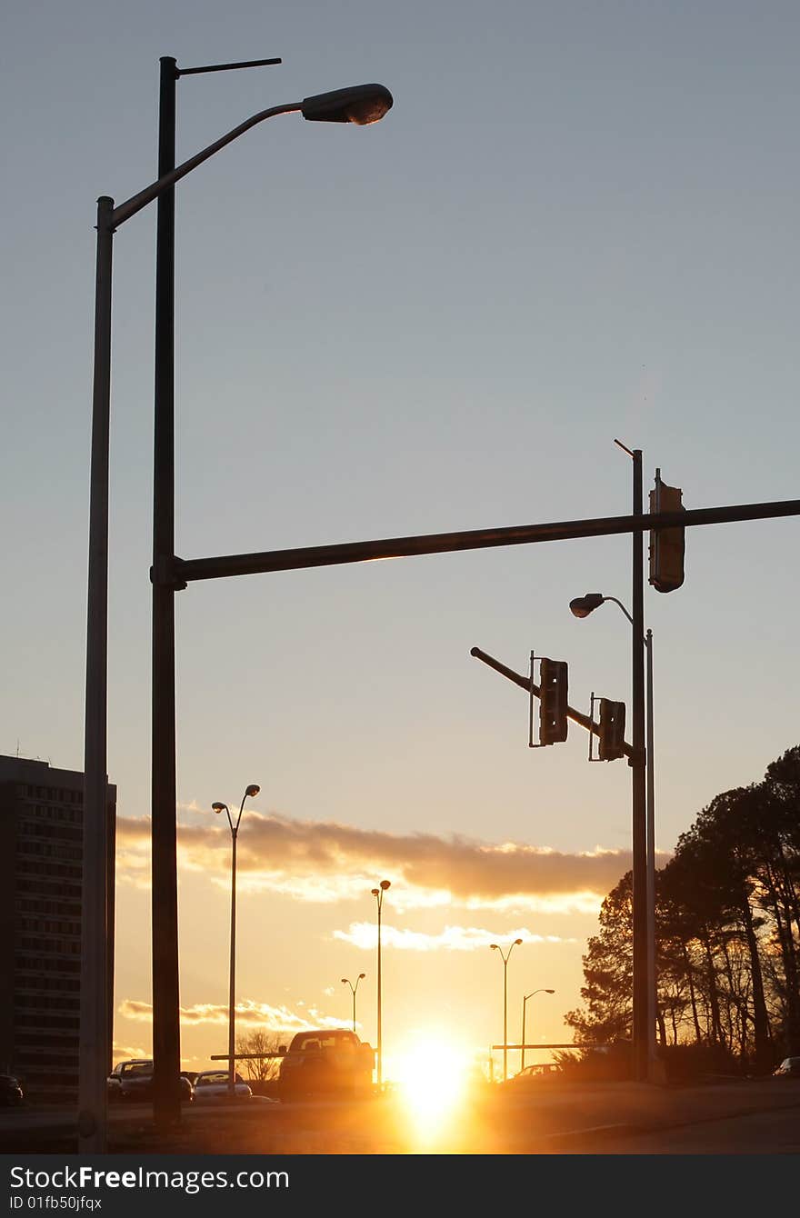 Silhouette of traffic lamps at sunset. Silhouette of traffic lamps at sunset