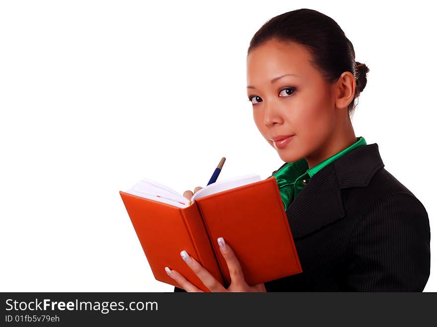 Beautiful business woman in a black suit with organizer. Beautiful business woman in a black suit with organizer