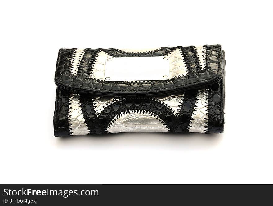 Shot of a black and silver purse on white